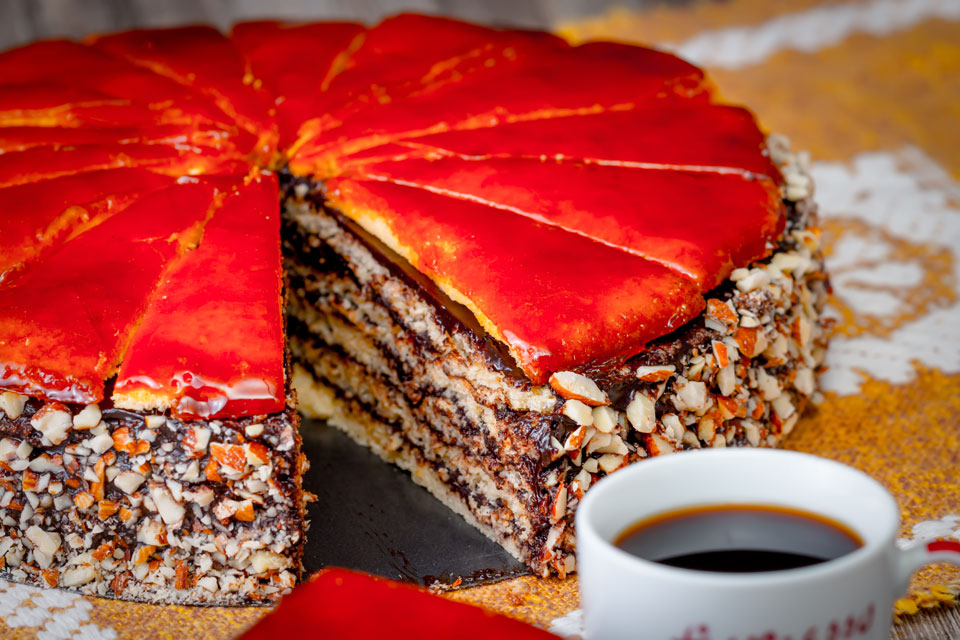 The Dobos Torte named after its creator József Dobos is a cake of legendary status in Hungary with its 6 layers, chocolate butter cream frosting and caramel topping